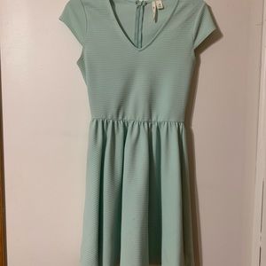 Turquoise, ribbed spring dress.